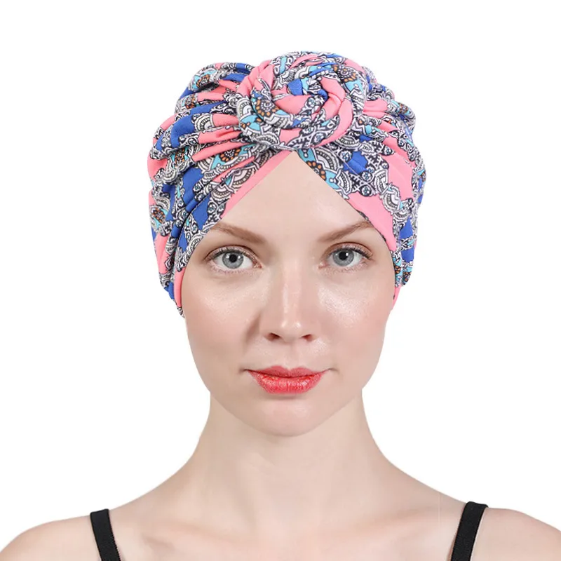 Bonnet turban extensible fleur tourbillon